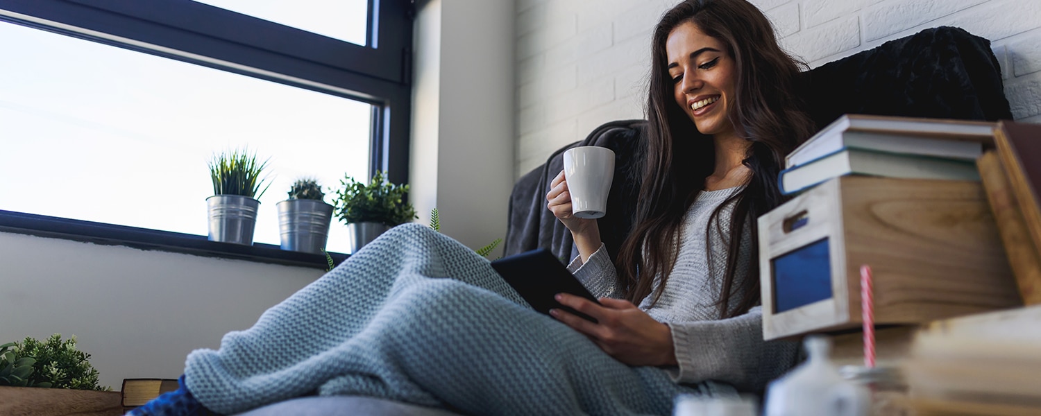 Native Ads | Native Advertisements | Woman Smiling at Phone