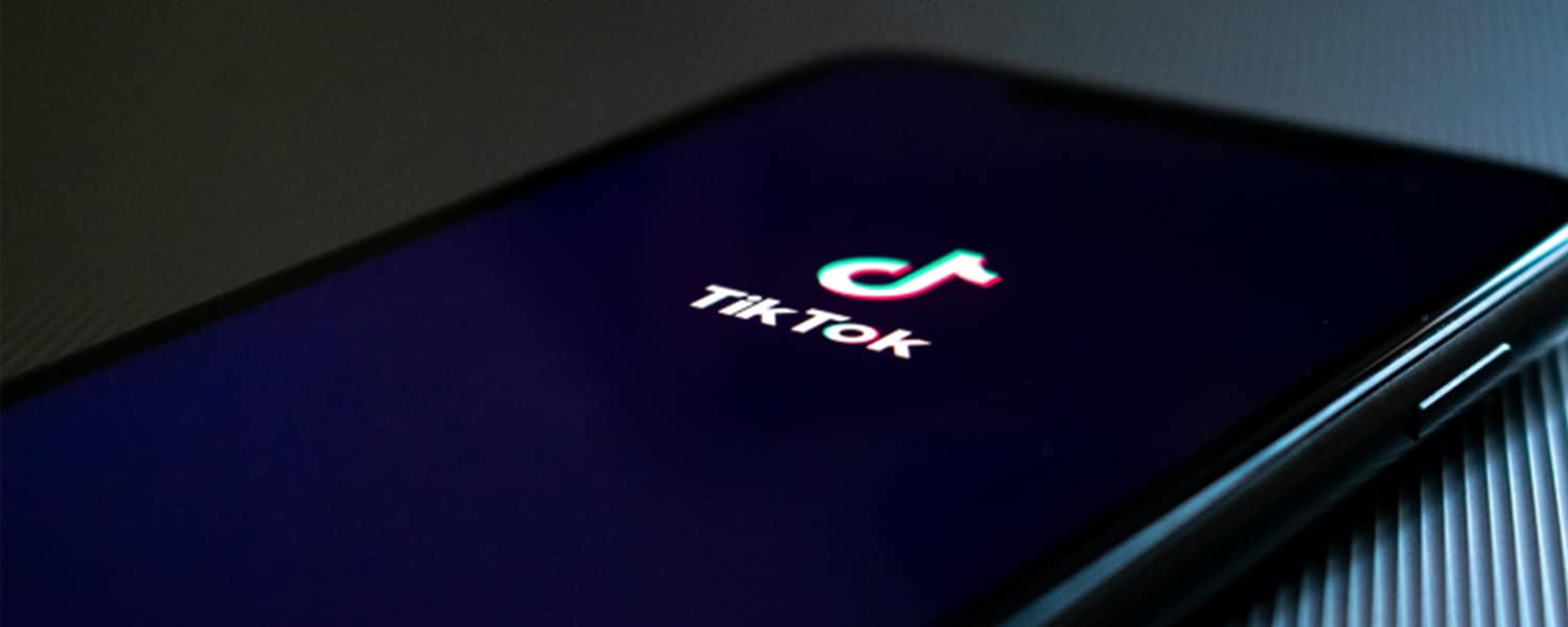 Advertising on TikTok | TikTok Advertising Agency | TikTok Displayed on Phone