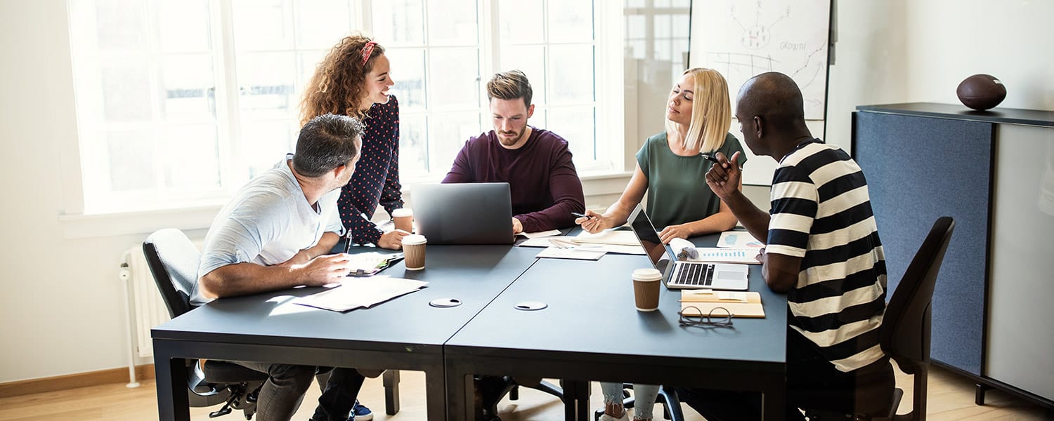 Online Marketing Firm | Online Marketing Services | Team Meeting Around Table