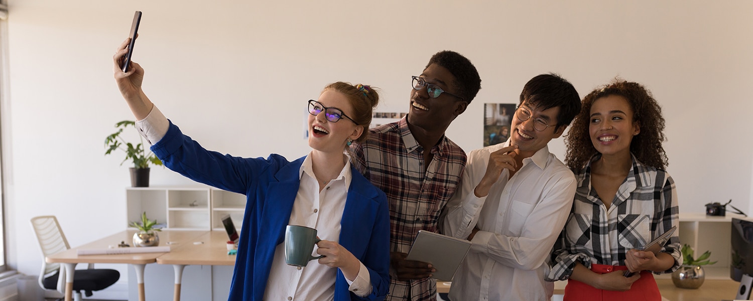 TikTok for Business | TikTok Ad Platform | Group of Coworkers Take Selfie