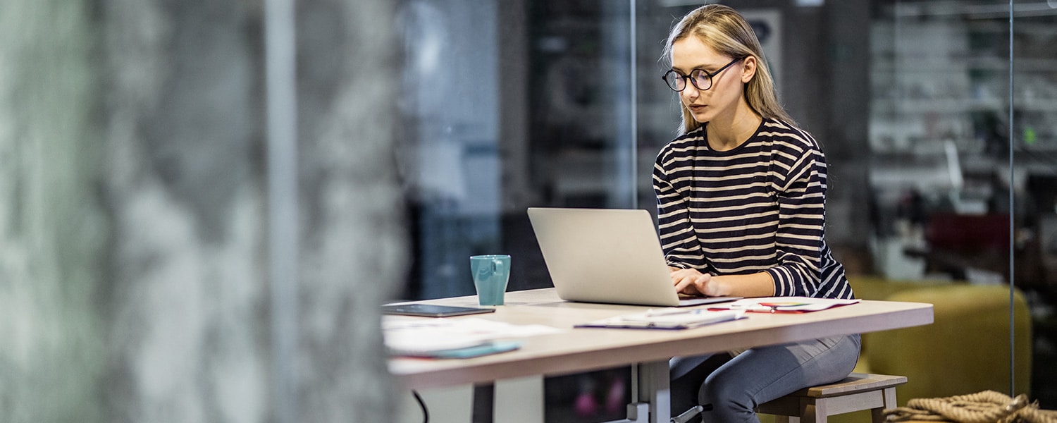 Content Marketing Services | How to Make Engaging Content | Woman at Laptop