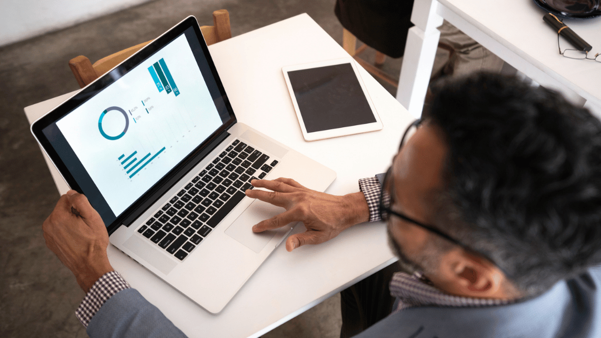 How to Monitor a Brand's Social Media | Monitoring Brand Social Media | Man at Laptop